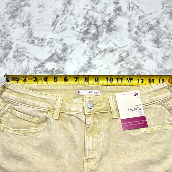 SO Brand Yellow Acid Wash Stretch Denim Shortie Shorts Low Rise Rolled Hems NWT - Picture 6 of 6